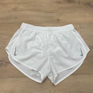 White Nike women’s dri fit fast tempo shorts